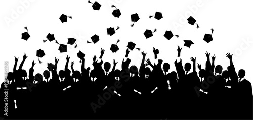 Large group of graduates throwing mortarboards in the air silhouette