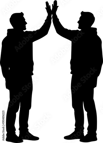 Two men giving high five to celebrate success
