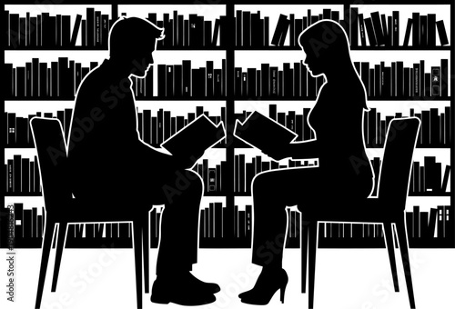 Two people sitting and reading in front of bookshelves silhouette