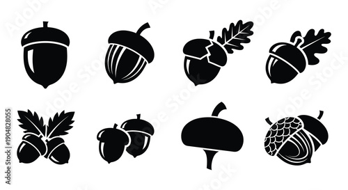 A collection of black silhouette acorns in various styles and orientations