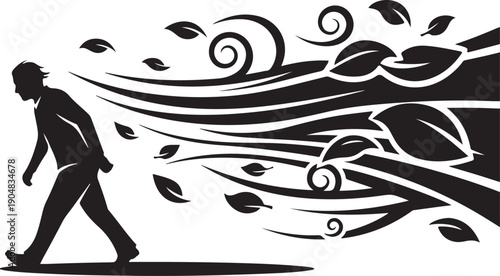 Man walking with leaves blowing in the wind silhouette