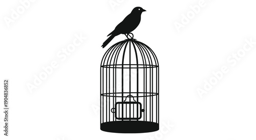 Black bird silhouette perching atop an empty, traditional wire birdcage, symbolizing freedom and imprisonment against a