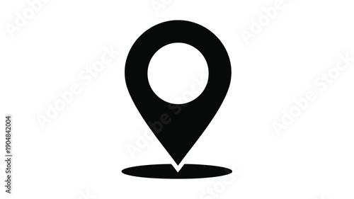 a black location pin icon design with a prominent white central space silhouette