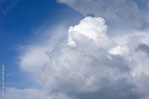 Dramatic cloud formations and blue skies in the Alps