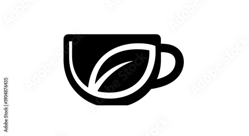 Black teacup with leaf design