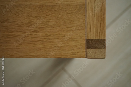 Geometry. Acute angle of a walnut wooden table