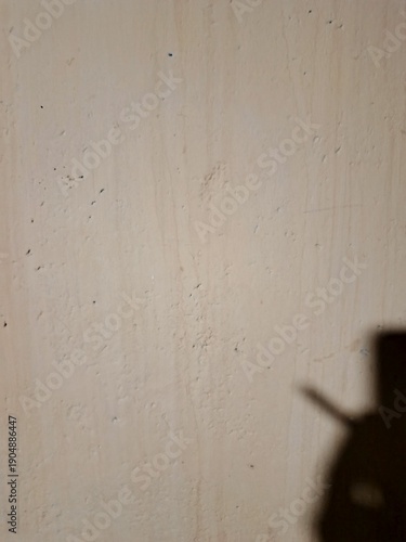hand holding a wall