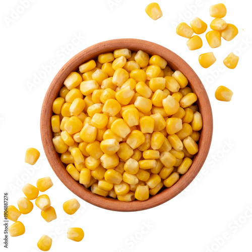 Golden maize kernels filling a rustic earthenware bowl against a deep, dark void