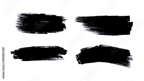 Set of Textured Black Ink Brush Strokes and Hand-Drawn Paint Smear Design Elements
