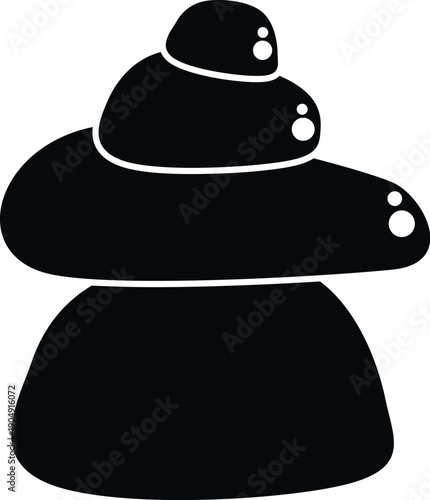 Stacked stones forming a cairn representing balance, harmony, meditation, and well being