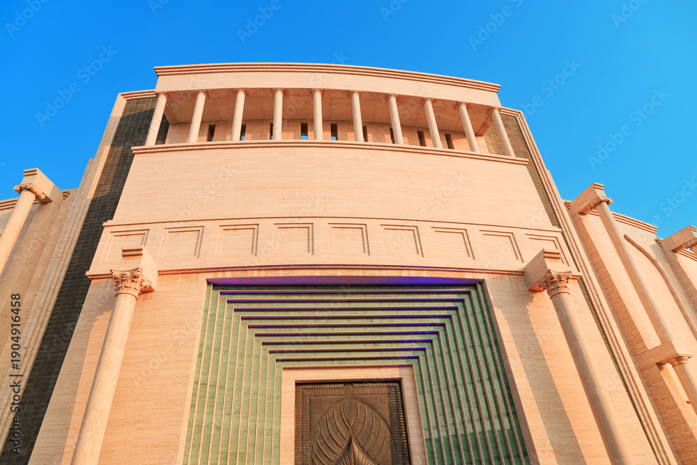 Naklejka premium 1 December 2025, Doha, Qatar: Grand entrance of the Katara Cultural Village Amphitheatre showcasing intricate Arab architecture and intricate details