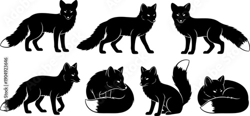 Collection of eight black silhouette foxes in various poses and shapes silhouette