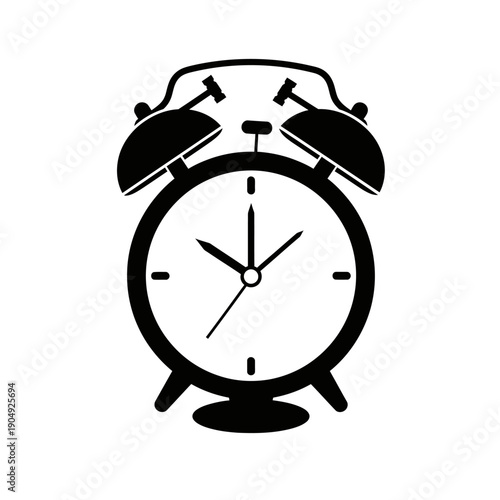 Classic black alarm clock with twin bells showing approximately ten past ten