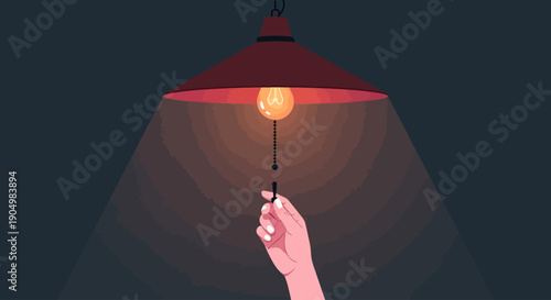 A hand holding a light bulb under a lamp, representing an idea or innovation in a creative environment from a direct viewpoint