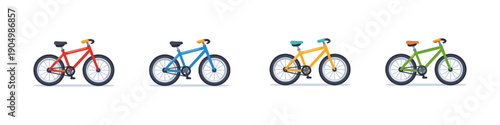 Collection of four colorful bicycles lined up against a white background