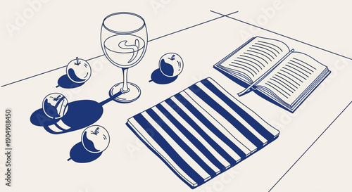 A table setting with a wine glass, plates, and an open book on a striped placemat viewed from above