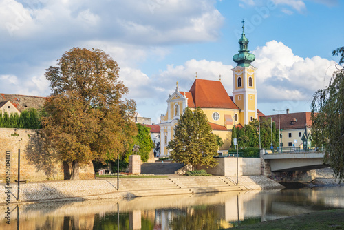 Vászonkép The Carmelite church and bridge over Raba river in Győr - Hungary