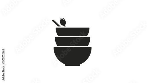 Black bowls stacked with spoon on top.