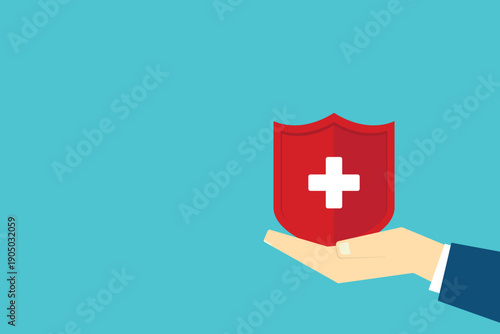 Hand holding shield with cross for the healthcare medical icon. Health insurance health concept. Access to welfare health and copy space