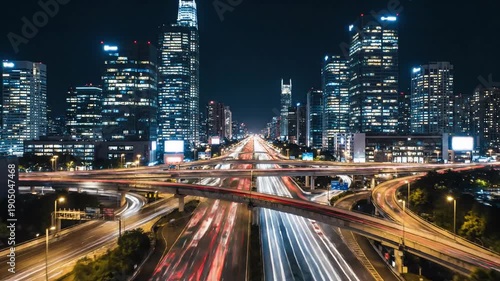 Wallpaper Mural Nighttime city highway with light trails and skyscrapers, urban transportation and modern architecture Torontodigital.ca