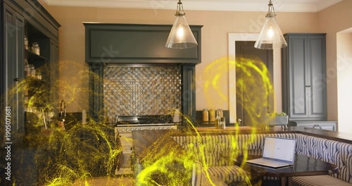 Fotografia Featuring kitchen interior with range and hood, pendant lights, banquette with l