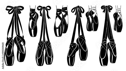 Suspended ballet pointe shoes with ribbons in a row, black and graceful.