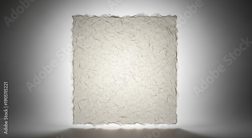 Elegant Deckle-Edged Handmade Cotton Paper Texture Background with Soft Backlighting.
