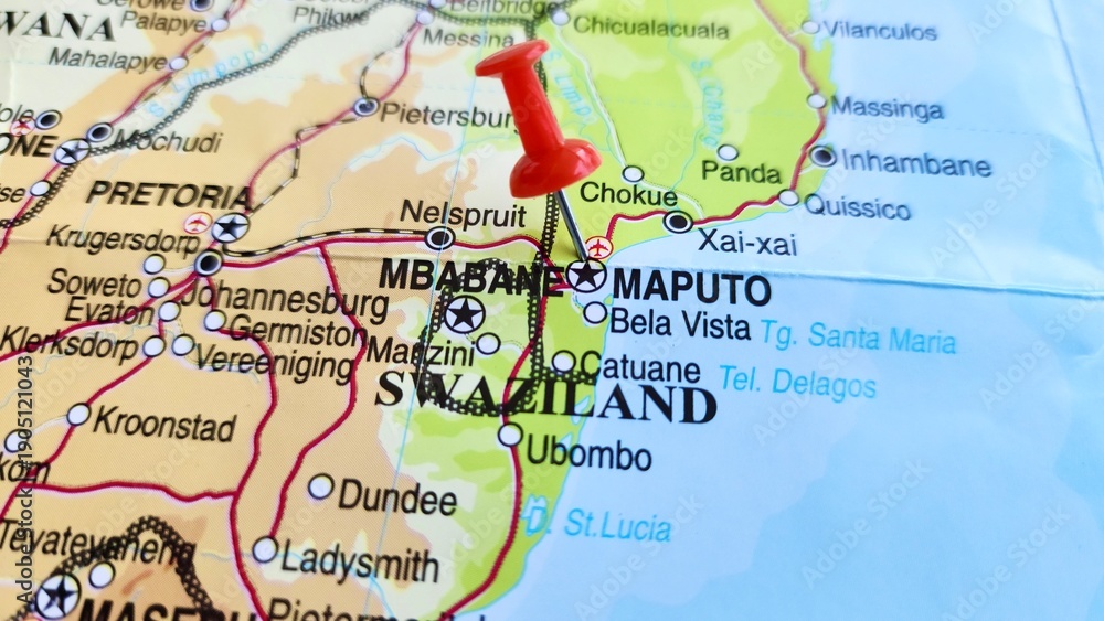 Fototapeta premium View of Maputo, Capital and chief port of Mozambique, on a geographical map of Africa, marked with red pushpin