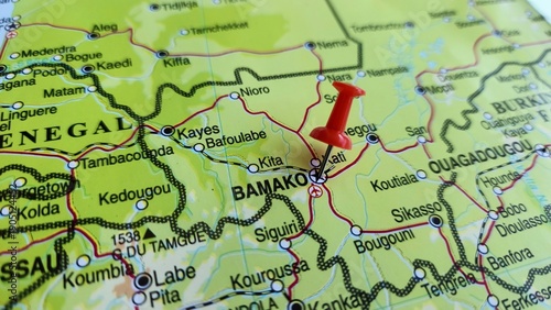Photos View of Bamako is the capital and largest city of Mali, West Africa, on a geographical map of Africa, marked with a red pushpin