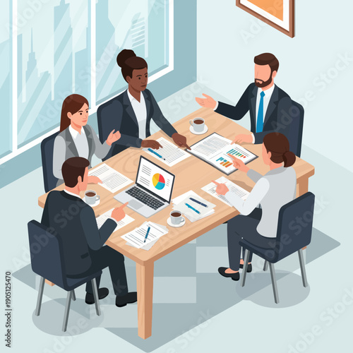 Business professionals having a meeting around a table with laptops and documents.