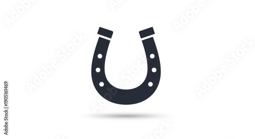 Black horseshoe icon with white dots on white background symbolizing good luck