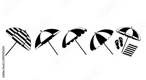 A set of six black and white beach umbrellas with various striped patterns and designs