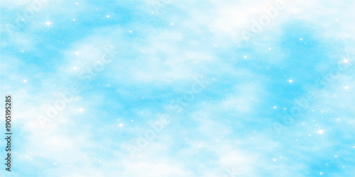 A bright and beautiful abstract blue winter background features fluffy white clouds and sunny bokeh light shimmering through a clear summer sky atmosphere