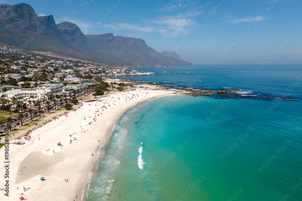 Obraz premium Breathtaking Camps Bay beach in Cape Town, South Africa, perfect for sunbathing and fun