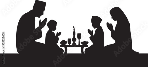 Family praying together at a table with food and drinks