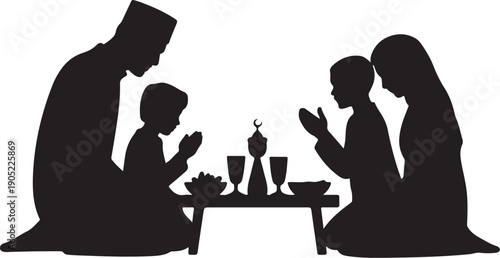 Family praying together at a table with religious silhouette