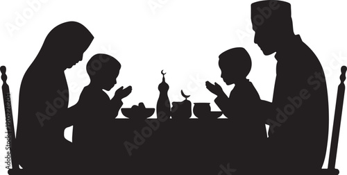 Family silhouette praying together at a table with food and religious