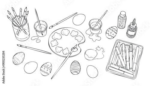 Assortment of tools and supplies for decorating Easter eggs including paintbrushes a palette glitter and markers perfect for holiday crafts and family activities