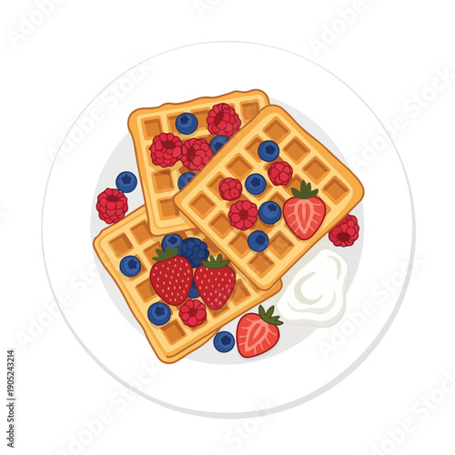 Plate of waffles topped with berries and cream