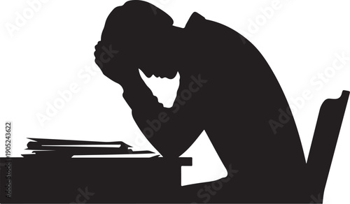 Silhouette of a person leaning on a table with papers