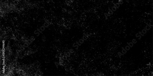 Old monochrome grunge background with dots, scratches and splats of paint. Grunge background of black and white