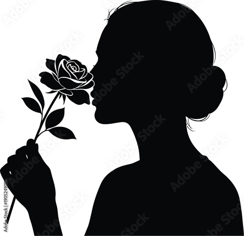 Woman silhouette smelling rose with elegance in profile view