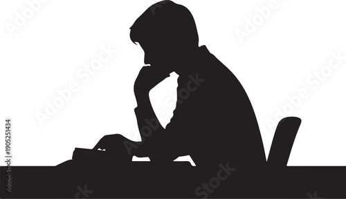 Silhouette of person sitting at desk with laptop and papers