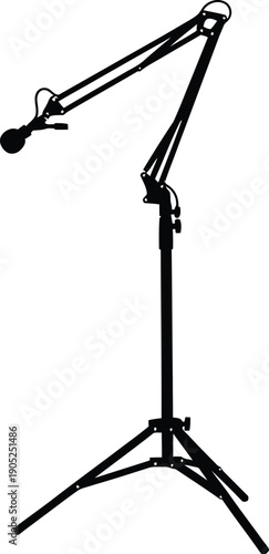 Adjustable microphone stand with boom arm and tripod base for stable recording equipment setup in studio environment