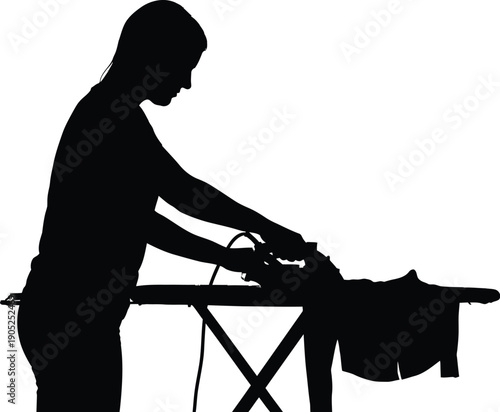Woman ironing clothes on ironing board with steam iron in a domestic setting viewpoint