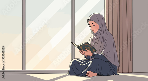 Young Muslim girl in hijab reading Quran by large window, peaceful morning light