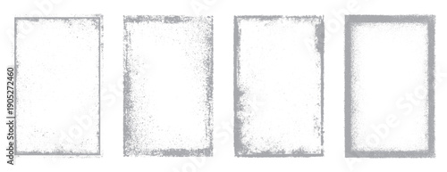 Four distressed grey rectangular frames with speckled texture and rough edges border grunge