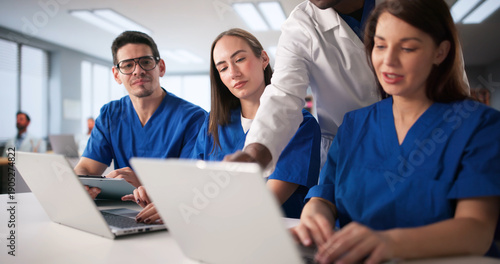 Medical Students Engage In Lesson With Healthcare Consultant