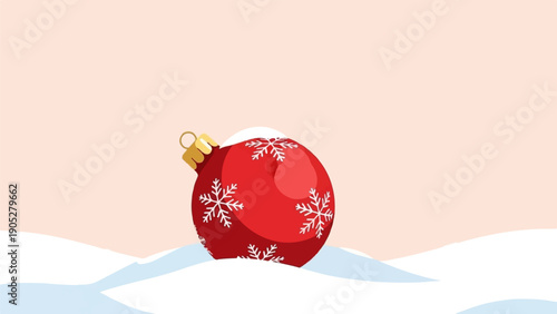Red ornament with snowflakes in snow
