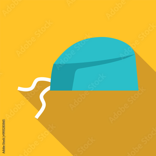 Teal surgeon cap with ties and long shadow on yellow background